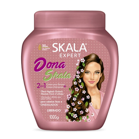 Máscara Skala Expert Dona Skala 1000g: El tratamiento de "Súper-Nutrición" diseñado específicamente para ondas y rulos que buscan ligereza; fórmula 2-en-1 con un complejo de óleos vegetales (Girasol, Palta, Coco y Linaza) que nutre profundamente, elimina el frizz y aporta un brillo espejo sin pesar.