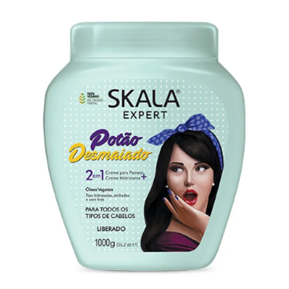 Máscara Skala Expert Potão Desmaiado 1000g: El tratamiento 2-en-1 de "Efecto Desmayo" inmediato; fórmula vegana y liberada con Óleos de Rícino, Argán y Coco diseñada para eliminar el frizz, reducir el volumen y proporcionar un alineamiento sedoso a la fibra capilar.